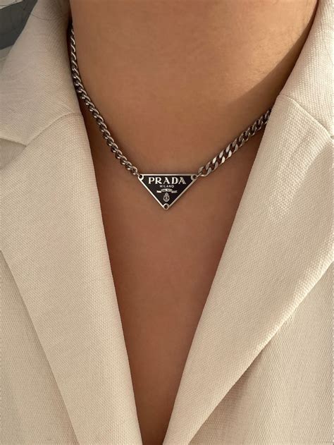 white and gold prada necklace|real Prada necklace.